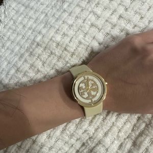 Tory Burch women’s REVA watch in cream and gold